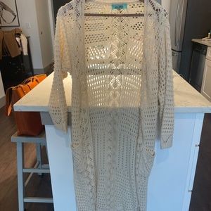 Cream colored knit duster with pockets